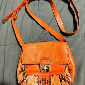 Cole Haan Orange Crossbody Bag with Adjustable Strap and Textured Design